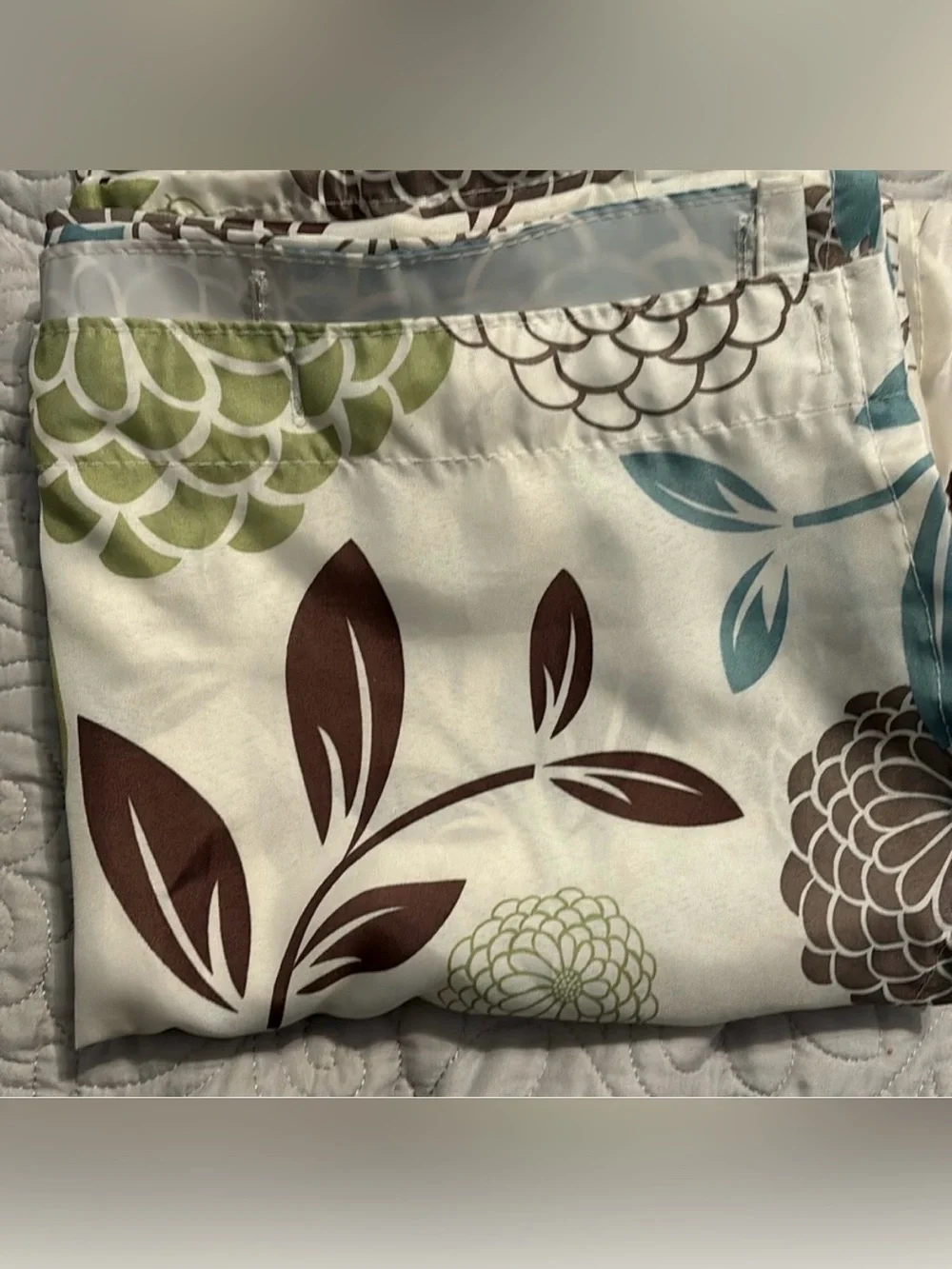Shower curtain with shower hooks